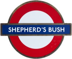 London Transport target/bullseye enamel sign SHEPHERDS BUSH mounted in original bronze frame on MDF.