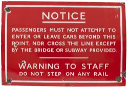 London Transport enamel sign PASSENGERS MUST NOT ATTEMPT TO LEAVE CARS etc. Measures 35in x 24in and