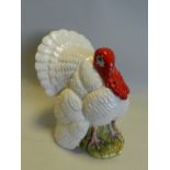 A Royal Doulton figure of a turkey modelled by Graham Tounge commissioned by Bernard Matthews in