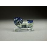 A Chinese cameo glass figure of a lion dog, 19th/20th Century, modelled standing,