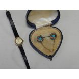 A turquoise and diamond set brooch together with 9ct gold ladies accurist wristwatch.