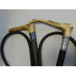 A gentleman's horn handled hunting whip with silver collar by Whippy saddlers,