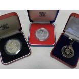 Two Rolls Royce Enthusiasts Club medallions,