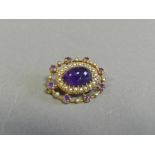 An 9ct gold amethyst and seed pearl brooch