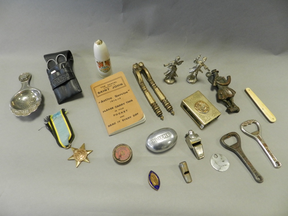 Works of art to include medals, medallions and badges, a pair of war plane desk ornaments,