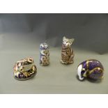 Four Royal Crown Derby imari paperweights, cat, badger,