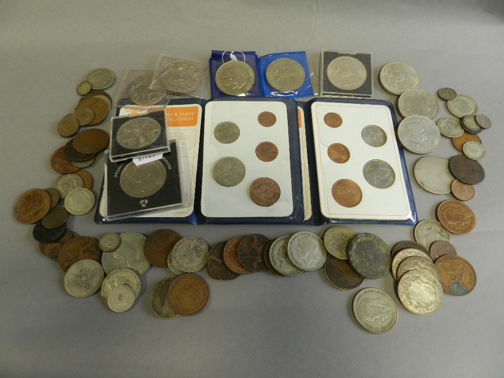 A collection of commemorative loose coinage