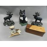 Works of art to include a pair of patinated cast metal figures of moose's/elks,