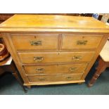 A late 19th/early 20th century pine chest of two short over three long drawers