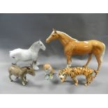 Beswick animal figures to include three palomino horses, a grey Shire horse, a tiger,