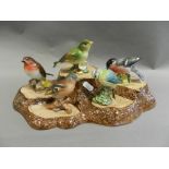 Beswick bird figures including: Wren 993 x 3, Gold Finch 2273, Chaffinch 991 x 3, Blue Tit 992,