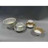 An early 19th century Derby porcelain tea and coffee set decorated with flowers and foliage on