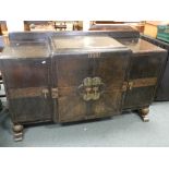 A 1930s ebonised oak veneered draw leaf dining table,