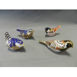 Four Royal Crown Derby Imari paperweights; Bunting, Nuthatch, Coal Tit and Wren, all with stoppers.