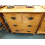 An Edwardian pine chest of two short over two long drawers