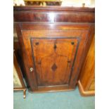 A 19th century inlaid oak flat front mural corner cabinet