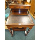 An Edwardian walnut davenport type desk