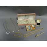 A collection of various pieces of costume jewellery and watches to include wristwatches,