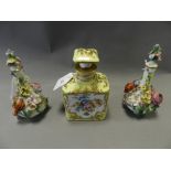 A pair of Bloor Derby flower encrusted scent bottles together with a French porcelain floral