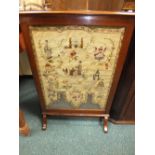 A mahogany framed Chinese style wool work fire screen