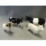 A group of Beswick animal figures including Shetland cow, Galloway cow,