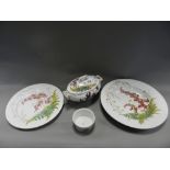 A Brown Westhead Moore & Co part dinner service decorated with a fern and flowers pattern