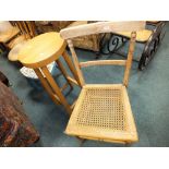 A collection of various chairs including Lloyd Loom style, rush seated dining chairs,