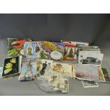 A collection of early to mid 20th century topographical postcards and a collection of Brook Bond