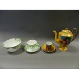 An English porcelain Art Nouveau tea service together with a continental porcelain coffee set