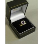 A purple and white stone set ring together with a diamond set half hoop eternity ring stamped 18k