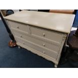 A modern painted chest of two short over two long drawer raised on short cabriole front legs along