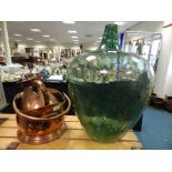 A large glass carboy (reduced) together with a Chinese stoneware jardiniere,