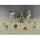 A collection of continental porcelain figures including a Meissen style Dresden porcelain figure of