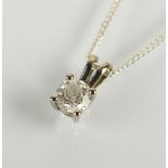 A single stone diamond pendant,