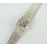 A lady's Omega diamond set cocktail watch,