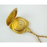 An 18ct gold Omega De Ville textured pendant watch, the circular champagne dial with batons,