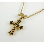 A late 19th century gold, diamond and black enamel crucifix mourning pendant,