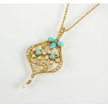 An early 20th century turquoise and seed pearl pendant,