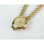 A Lady's 9ct gold Majex wristwatch, the circular silvered dial with Arabic numerals, manual wind,