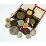 A collection of commemorative silver and bronze medallions, to include; Diamond Jubilee of Victoria,