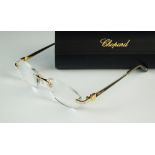 A pair of Chopard gold plated paste set glasses,