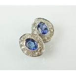 A pair of tanzanite and diamond earrings,