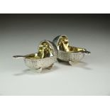 A pair of Victorian novelty silver salts in the form of cradles, Edward H Stockwell, London 1878,