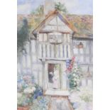 David Woodlock (1842-1929) Lady at a cottage door, signed lower right, watercolour,