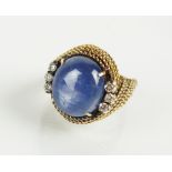 A star sapphire and diamond dress ring,