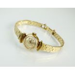 A Lady's Rolex Precision bracelet watch, the circular dial with batons, manual wind,