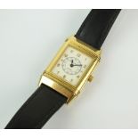 An 18ct yellow gold Jaeger-Le-Coultre Reverso wristwatch,