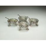 A set of four Victorian silver shell moulded salts, Roberts & Belk, Sheffield 1866,