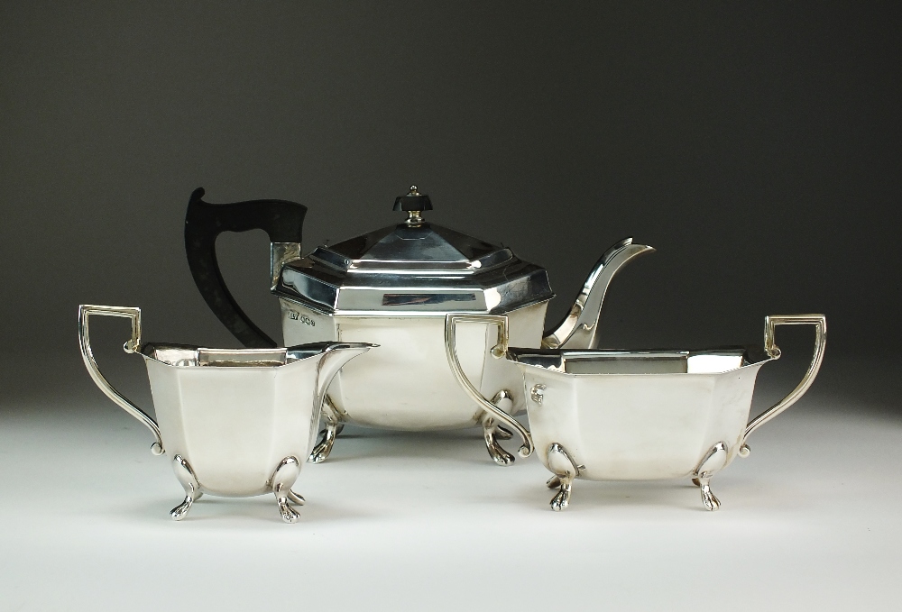 A three piece silver tea service, Emile Viner, Sheffield 1945, each piece of octagonal form,