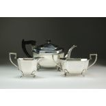 A three piece silver tea service, Emile Viner, Sheffield 1945, each piece of octagonal form,